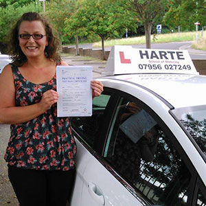 Mom holding test certifate at Chesterfield test centre.