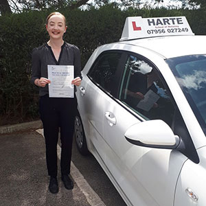 Young-woman-holding-pass-certificate-chesterfield